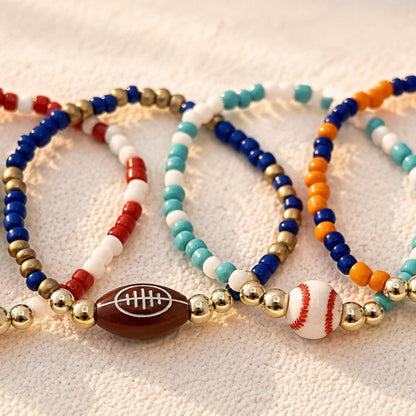 Athletic Bracelet Jewelry Customizable Sports Charm Design 14k Gold Filled Beads Stretch Wristband Comfortable Everyday Wear Football Basketball Soccer Baseball Tennis Cheer Options Perfect Youth Athlete Gift Team Spirit Accessory Game Day