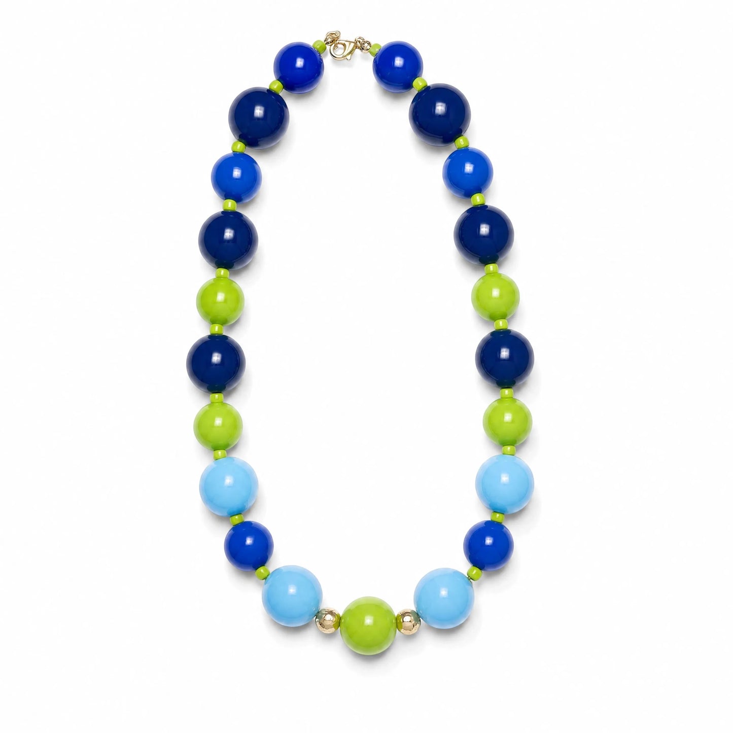 Robyn by design statement necklace featuring polished navy, electric blue, sky blue, and lime green spherical beads.